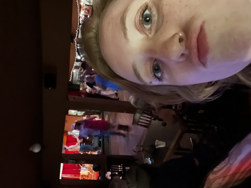 Lydia appears too close in the corner of an awkward selfie taken from the sound booth at Sagebrush in Austin, TX